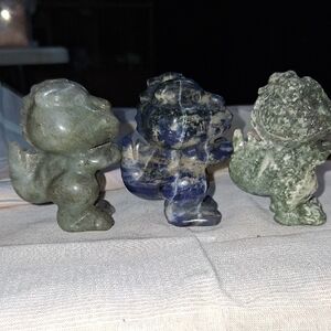 Set of Three Stone Dinosaur Figurines